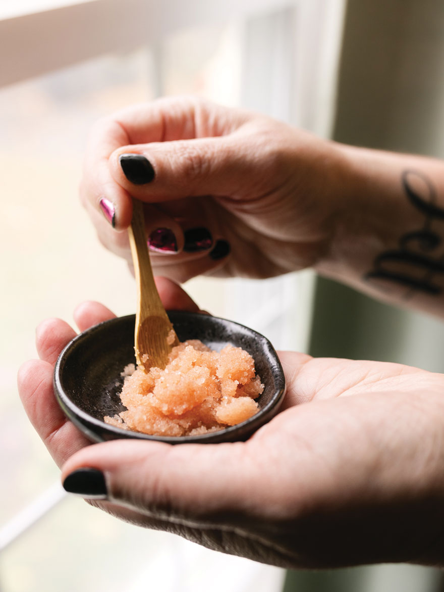 Body Scrub being stirred in a small bowl before a treatment at Massage by Whitney.